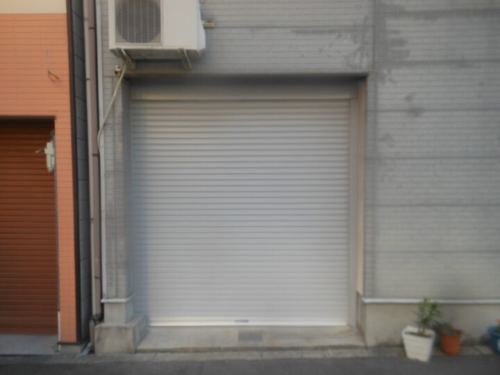 株式会社エイワシャッター天王寺　ガレージ電動シャッター取替えの画像