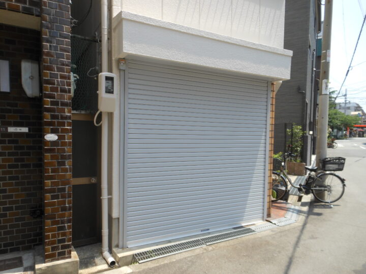 株式会社エイワシャッター 都島区 車庫電動シャッター取替工事の画像