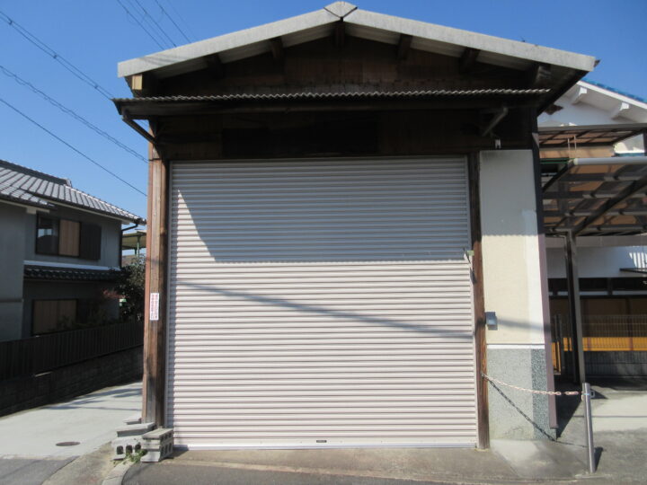 河南町 株式会社エイワシャッター 電動ワイドシャッター取替えの画像